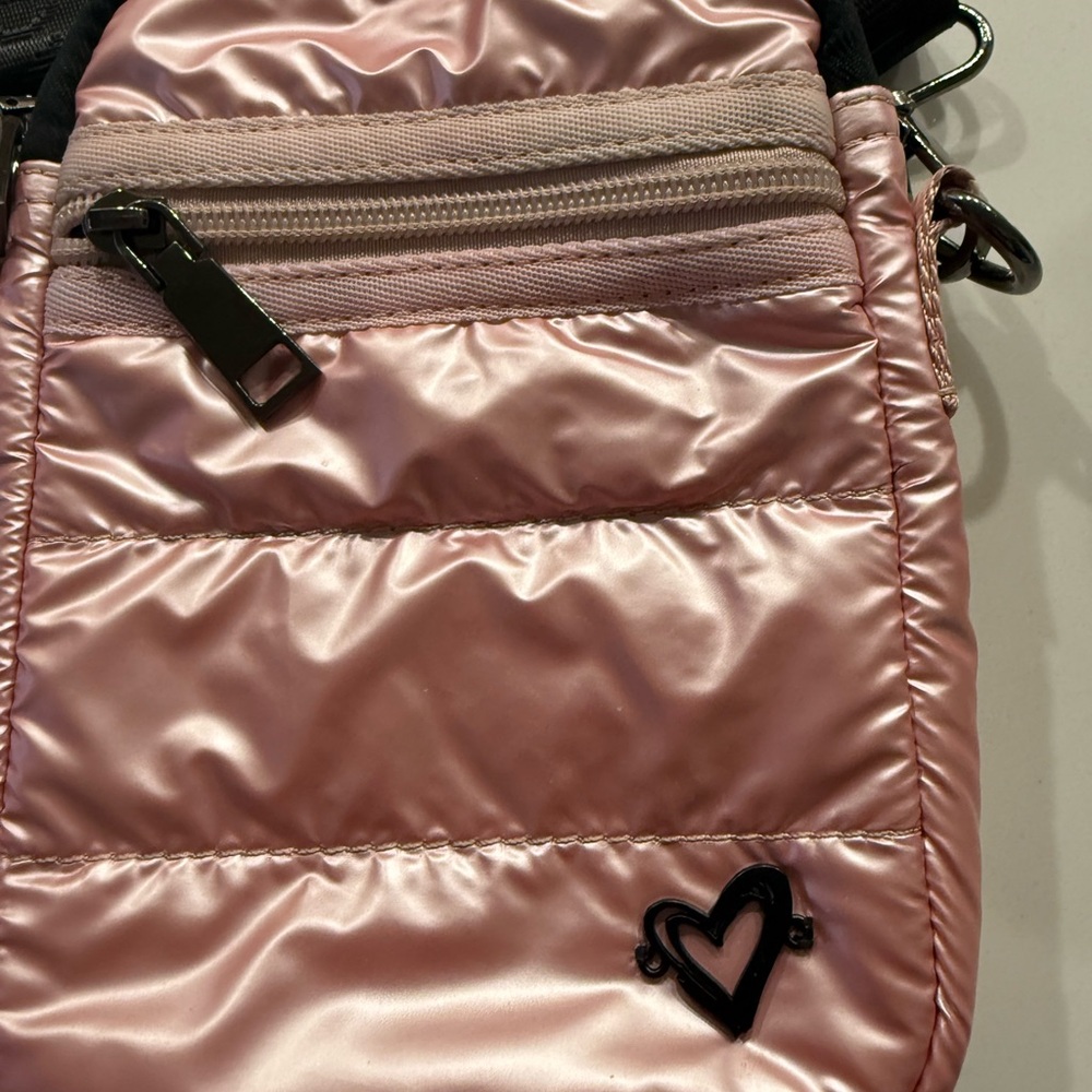 Elegant Pink Crossbody Bag with Heart Detail